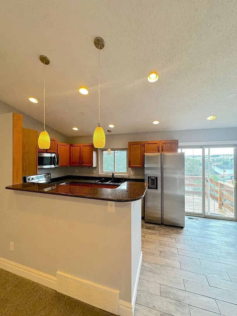 Move in ready home in 80918! — Photo 2
