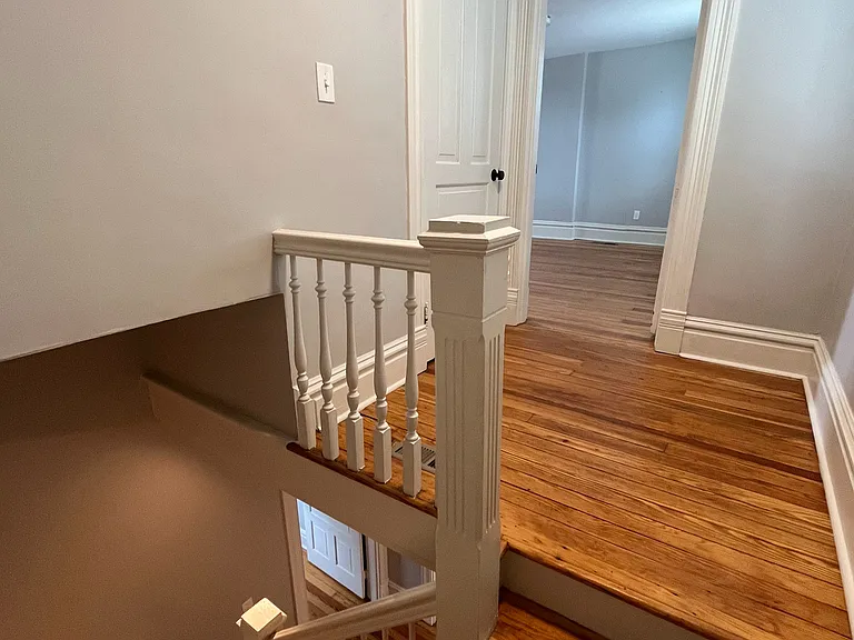 Staircase to 3rd bedroom, closet on left hand side of landing