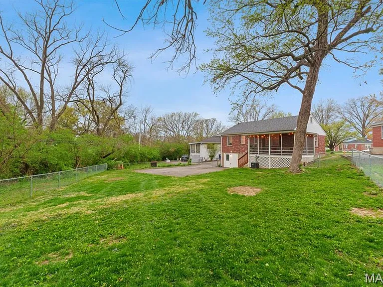 Fenced, large back yard.