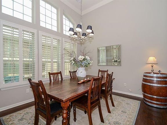 Two story foyer invites you into the rest of your beautiful home. Wrought iron spindles and on the staircase. Plenty of natural lighting floods the entry.