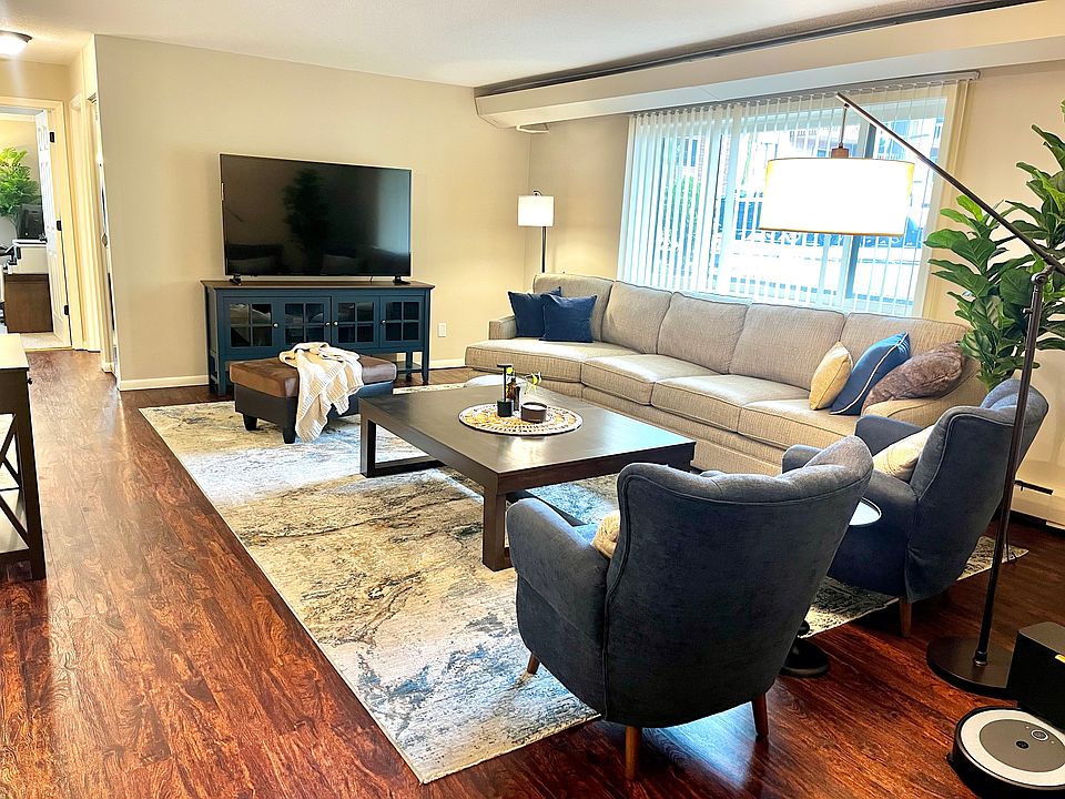 A spacious living room with an oversized couch