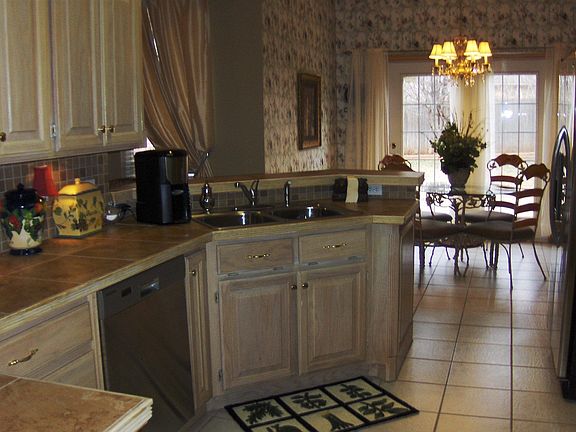Kitchen with new stainless appliances.