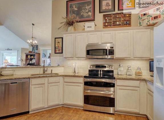 Granite tops, refurbished cabinets, subway tile backsplash