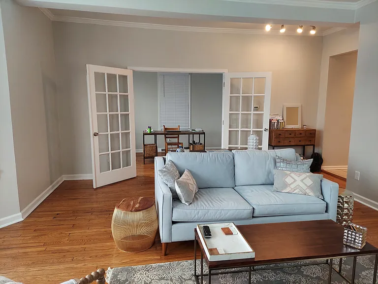 Living room view towards French doors.