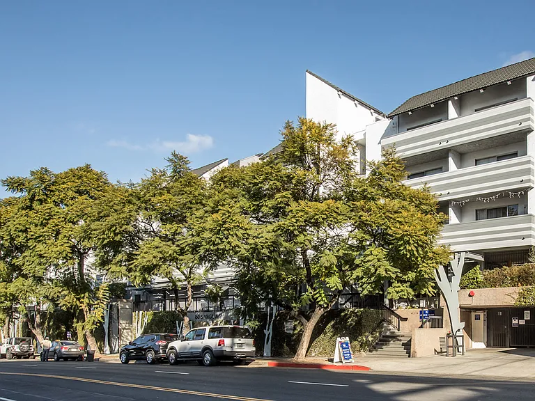 Exterior with First Floor Parking Garage