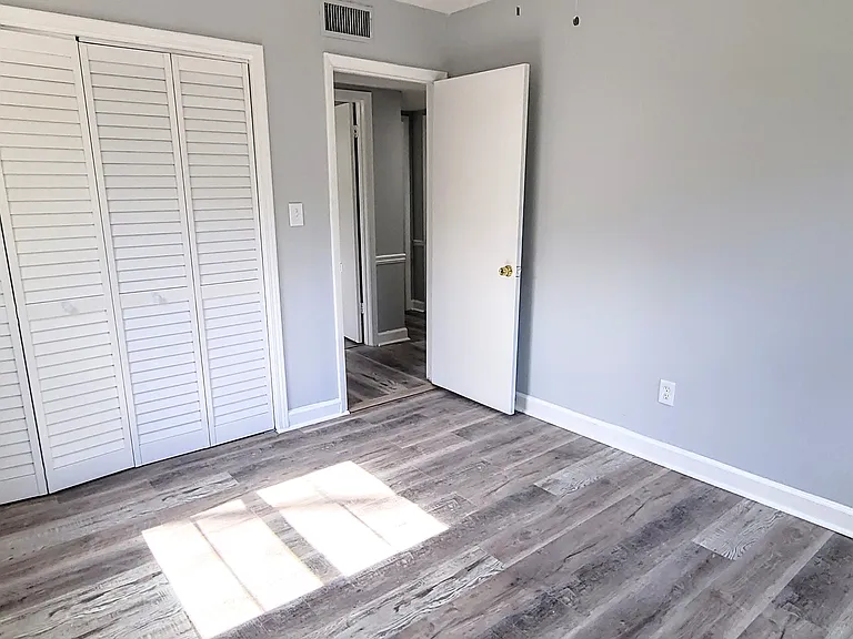 Bedroom #1, fully remodeled with abundant natural light