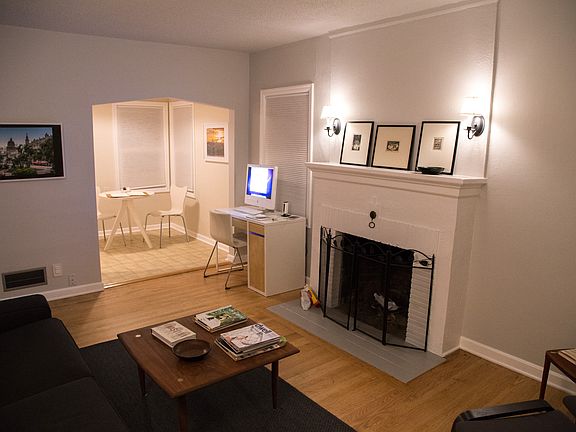 working fireplace. refinished hardwood floors.