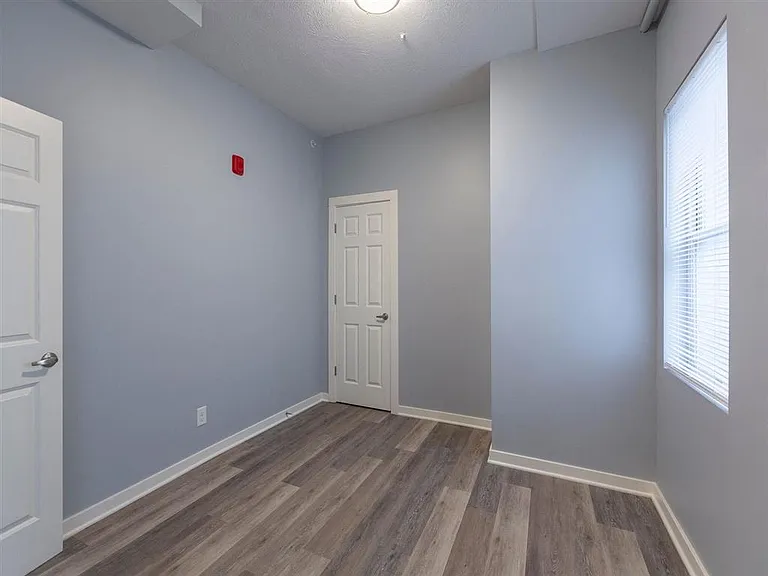 Bedroom in a unit at Park Avenue Apartments.