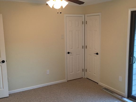 Bedroom view facing both closets