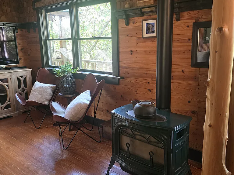 Cozy gas/electric fireplace on main level. Home also includes two mini-splits, one on each level.