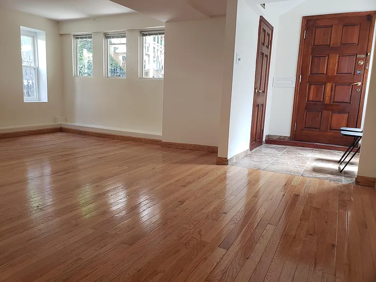 Spacious Entry and Living Room with over-sized Storage Closet