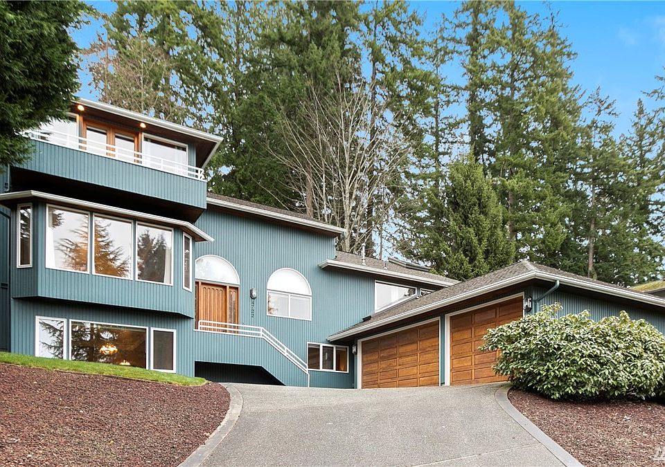 Gorgeous Custom 2-Story with Walk-Out Basement is Brimming with Charm! Extra Large 3-Car Garage for Parking, Storage, and Hobbies