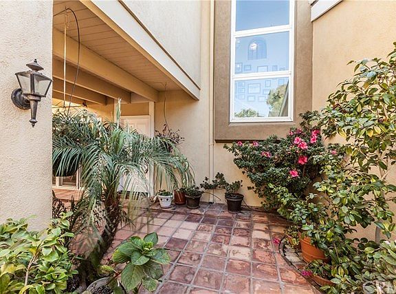 Your guests will enter into this beautifully landscaped courtyard