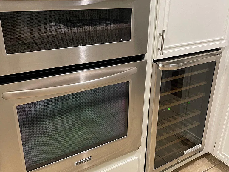 Microwave, wine fridge & oven