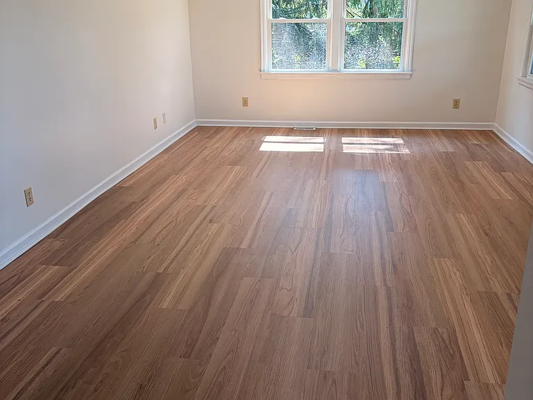 family room on west side with new vinyl flooring