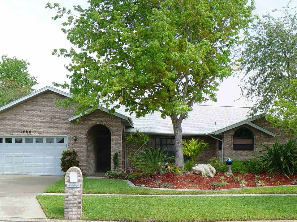 All brick, fully landscaped