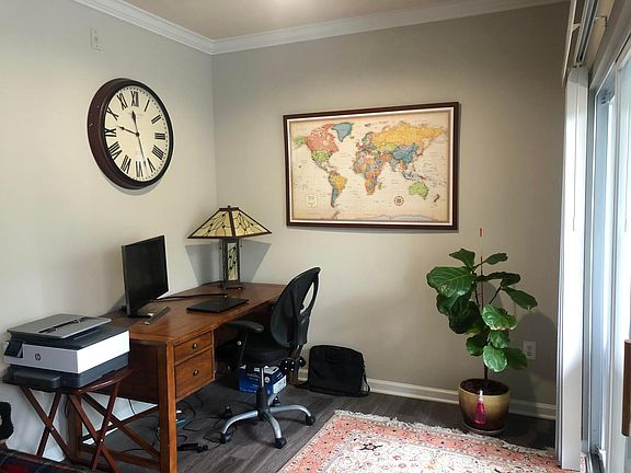 Den can accommodate a large desk