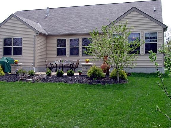 Custom paver patio. Great place to have summer meal and watch wildlife or golf