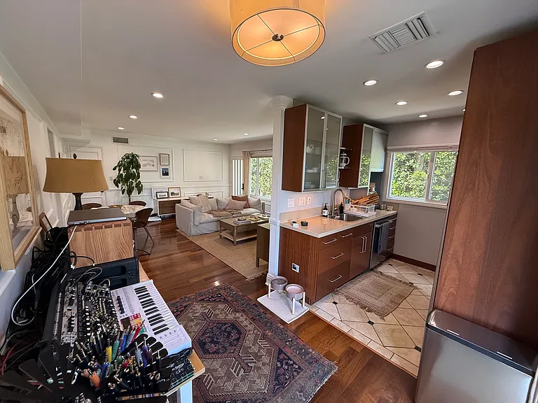 Kitchen off living room. Tenant using Dining room for other things