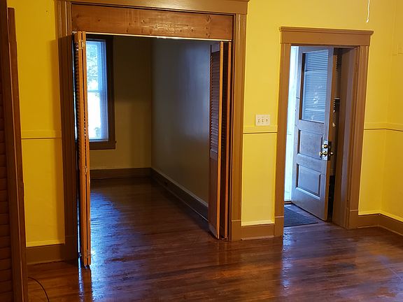 FRONT ENTRANCE , FRONT BEDROOM , LIVING ROOM