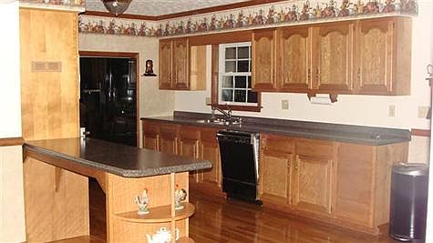 kitchen with oak hardwood flooring