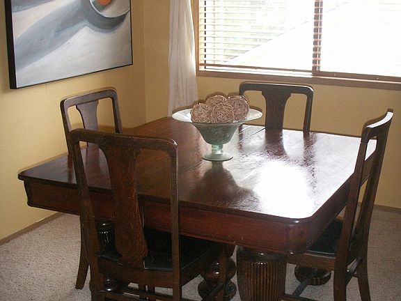 The dining room is bright and has a view of the Cascade Mountains!