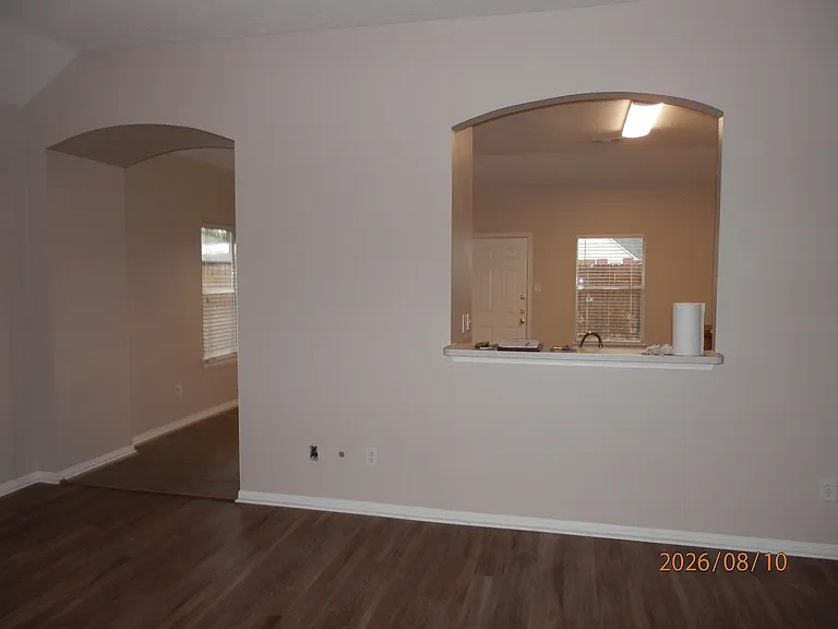 View from family room of kitchen and dining area