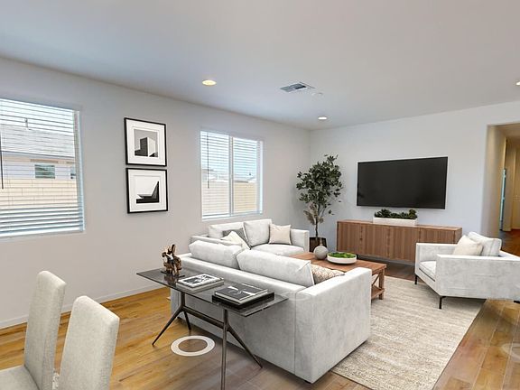 Virtually staged great room in Clover Floor Plan at Highland Sage