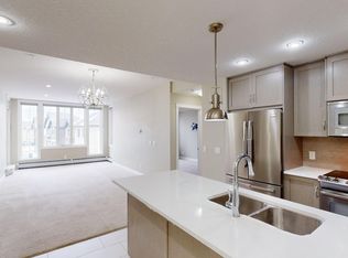 39 Quarry Gate SE #206, Calgary, AB T2C5P4