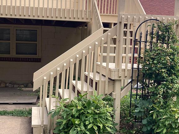 Stairs to upper apartment.