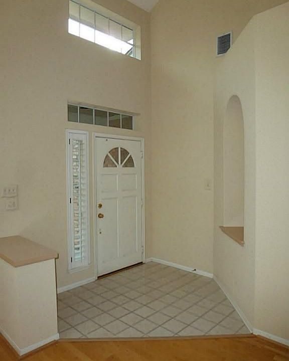  The entry is amazing with huge, grand ceilings.