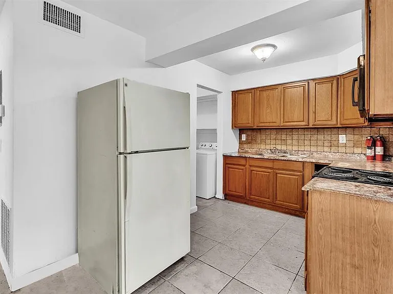 5748 NW 27th Ct — Photo 15