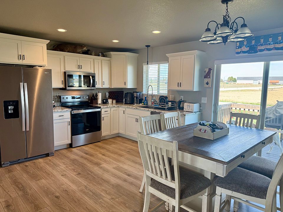 Kitchen - dinning room with deck & backyard access