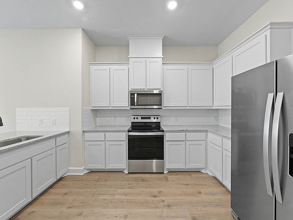The kitchen of the Noma has sprawling granite countertops.