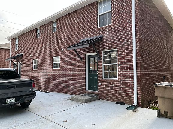 REAR ENTRANCE AND PARKING