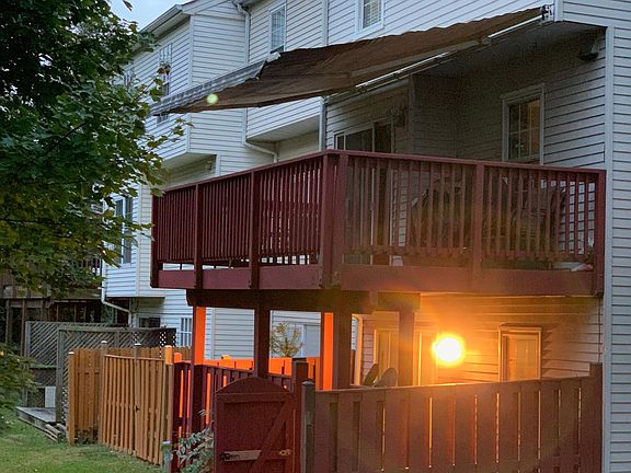 Back view shows deck and canopy
