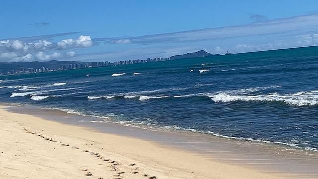 Steps away from the white sandy beach right behind the house