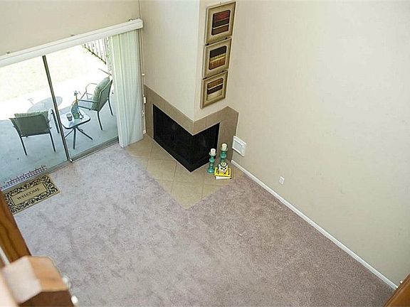 View of family room from upstairs landing. A great place for relaxing and enjoying time with family 