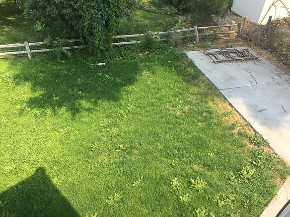 View of the east side of the backyard and the RV parking pad