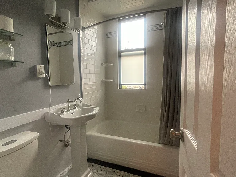 Bright Bathroom with its own window.