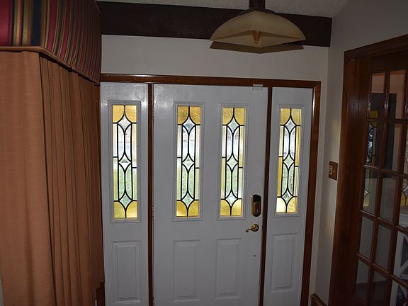 Entry foyer with smart lock.