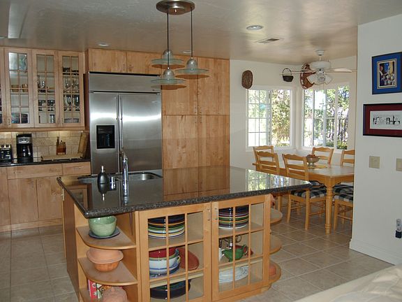 Kitchen with Island Stainless Sink and Breakfast Nook