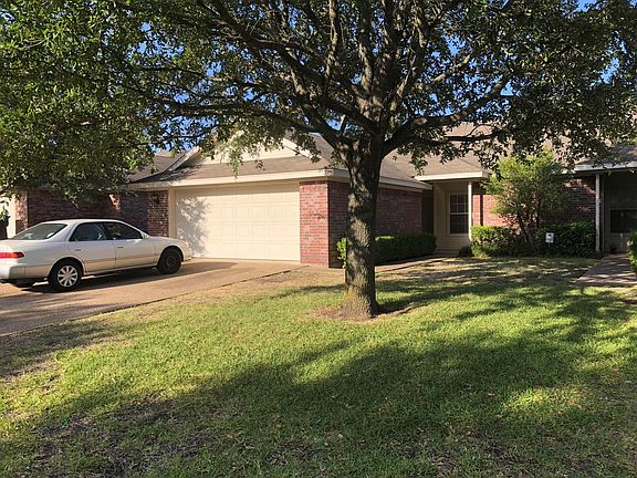 Duplex with 2 car enclosed garage and 2 car driveway
