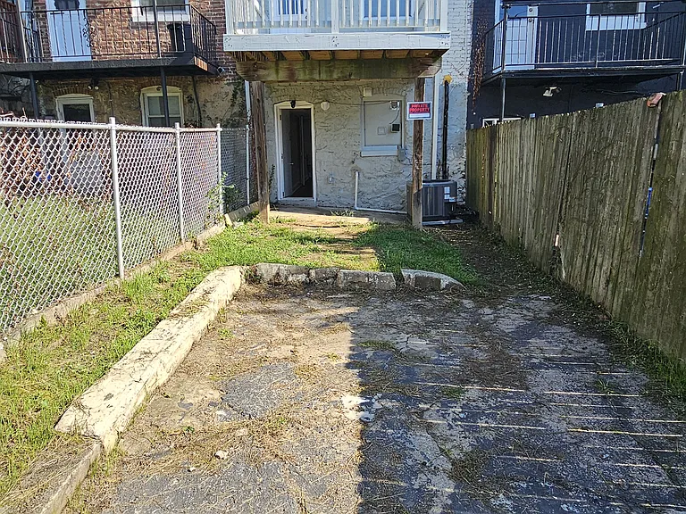 Back of the Property with Parking Spot