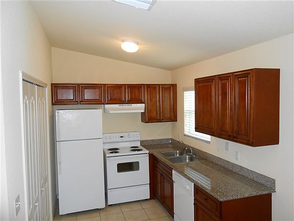 Kitchen with washer dryer in closet
