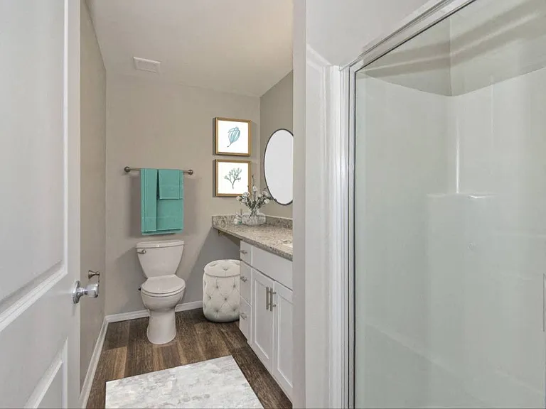 Renovated bathroom with walk-in shower in a Garden Home