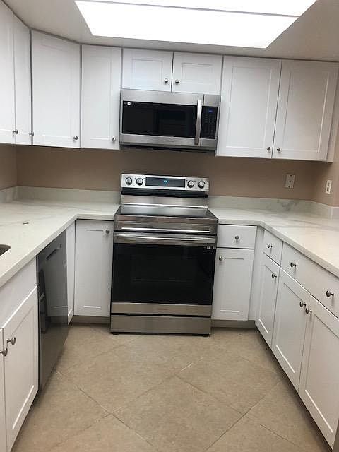 NEW CABINETS AND APPLIANCES