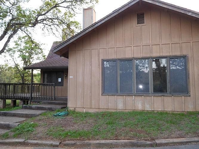 Large Home on acreage with a barn and lots of pote