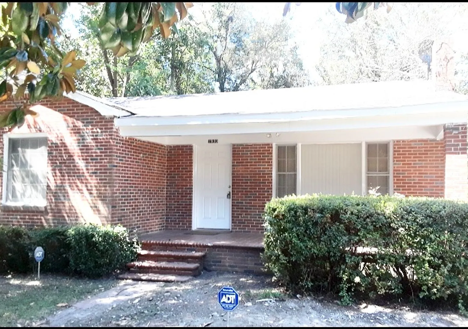 Freshly Updated Brick Ranch with Room to Relax — Photo 1