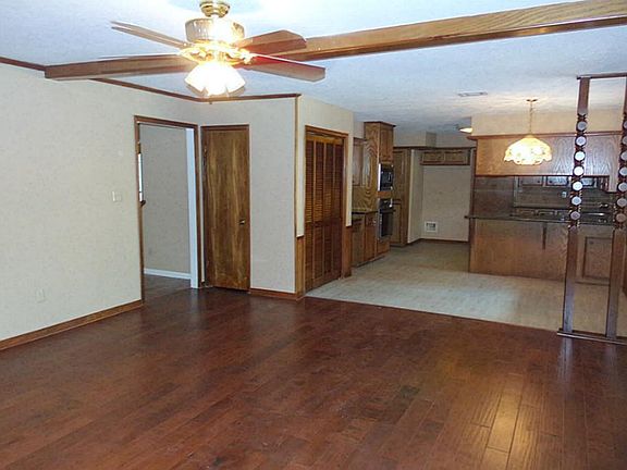 Looking from the den into the kitchen and morning room.  Mom is never far from the family.
